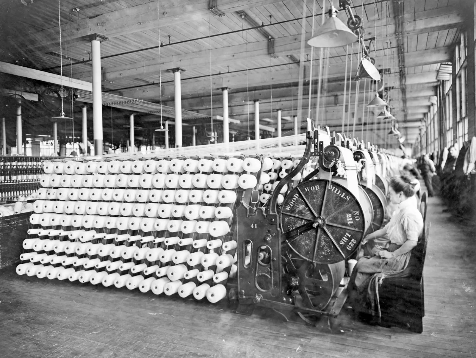 Women working on industrial machines