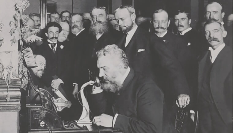 Graham Bell opening long distance line by phoning Chicago from New-York